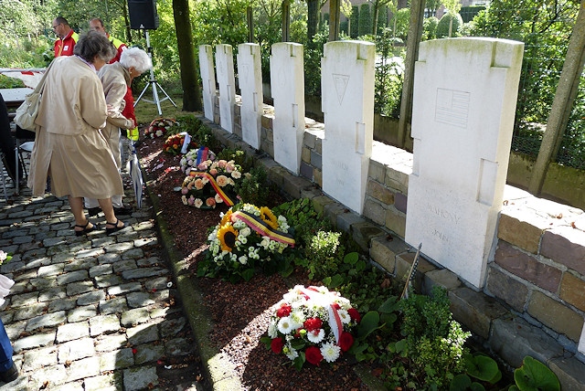 The permanent memorial markers for Harold Hoyle and his fallen comrades as they stand in Waregem today during one of the annual ceremonies 