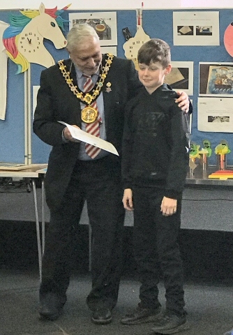 Mayor Mohammed Zaman handed certificates to participants from Brownhill Learning Community