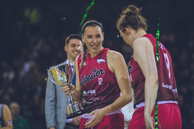 Mollie Campbell accepting the Women's British Basketball League trophy after the Leicester Riders reigned victorious