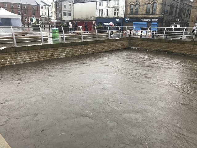 River Roch in Rochdale town centre is dangerously high, 3.00pm Saturday 16 March 2019