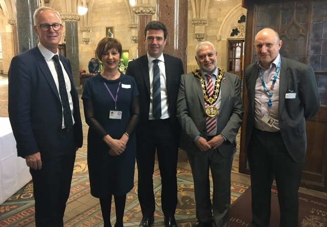 Steve Rumbelow, Chief Executive of Rochdale Borough Council and Accountable Officer of NHS HMR CCG; Jackie Taylor, Head of Clinical Services and Development at Rochdale Health Alliance; Andy Burnham, Mayor of Greater Manchester; Mohammed Zaman, Mayor of Rochdale and Dr Chris Duffy, Chair of NHS HMR CCG and local GP