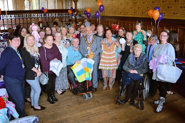 Mayor Mohammed Zaman with knitting groups from across the borough to showcase knitting’s power to weave the borough together