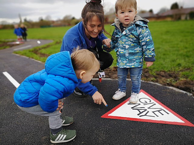 Children from Shutters Day Nursery learning about the cycle track signs 