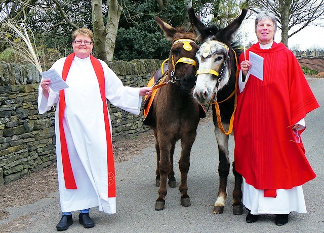 Vicar of St Andrews, Dearnley, the Rev Rachel Battershell (left) with donkeys Tyson and Blossom before the Palm Sunday service last year
