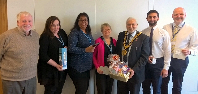 Mayor Mohammed Zaman presented his big raffle prizes from the Mayor's Charity Ball to some of the winners at Number One Riverside