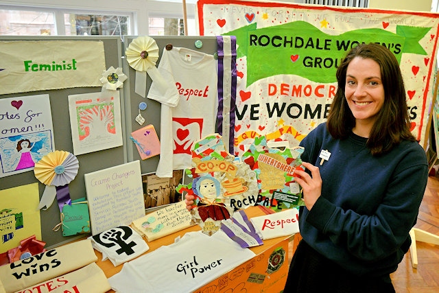 Local artist Sophie Bullock on the Rochdale stall at the event with the art and jigsaw piece created by the young people