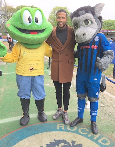 Former Rochdale AFC forward Joe Thompson with Springy the Frog and Desmond the Dragon