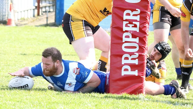 Aidy Gleeson scoring a try for Mayfield