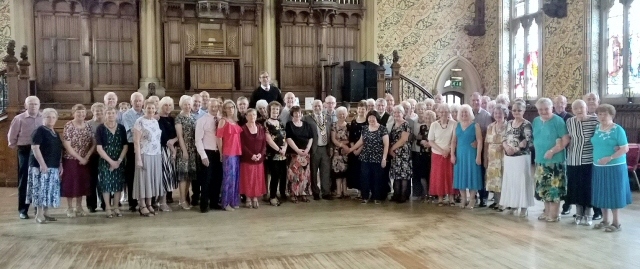 Mayor Mohammed Zaman drew the raffle for his charities at a Tea Dance in Rochdale Town Hall