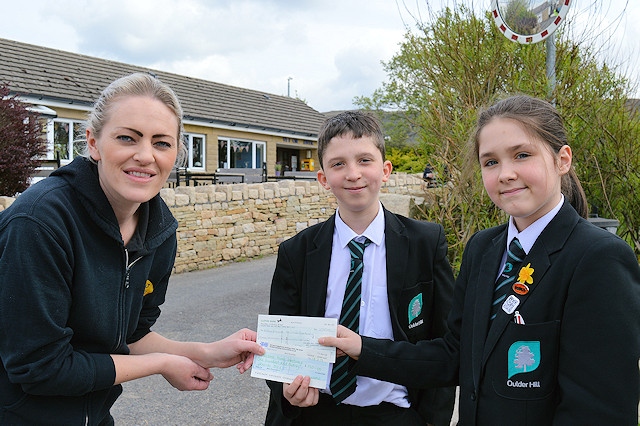 Year seven at Oulder Hill Community School have raised £1,500 for Bleakholt Animal Sanctuary