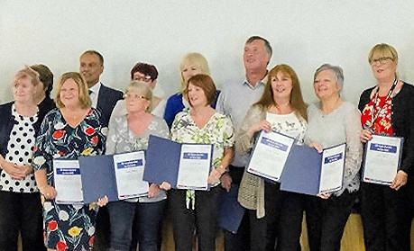 Certificates were presented to the long serving staff members 