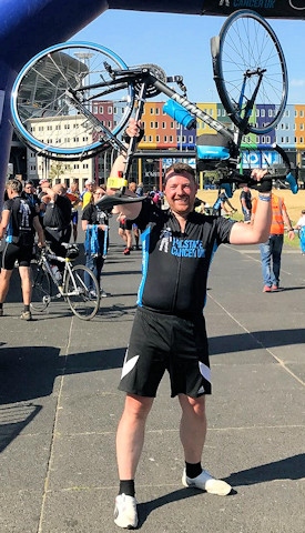 Andrew Dolan at the finish line of the 2018 Football to Amsterdam cycle
