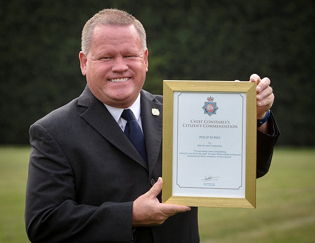 Councillor Phil Burke  with his award