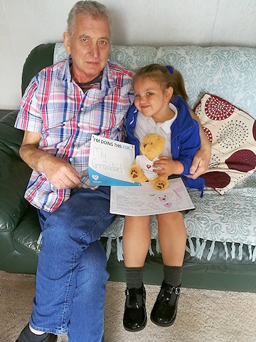 Lillie-Mai Davies with her beloved grandad, John Thornley, and her 'chemo bear'
