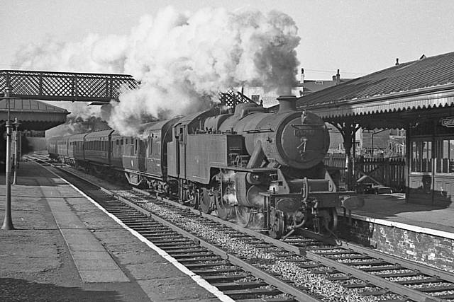 Class 4MT number 42288 runs through Castleton Station with the 9.5am Liverpool to Rochdale passenger, 17 April 1960