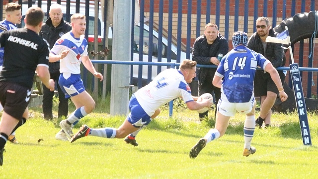 Lewis Butterworth, Mayfield going in for a try against Lock Lane