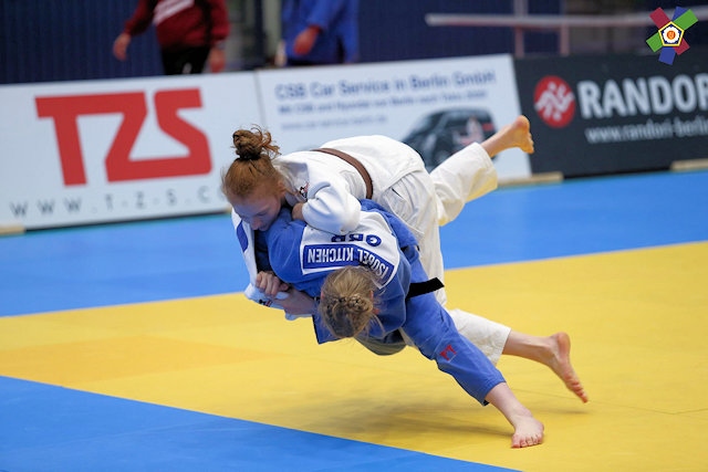 Isobel Kitchen (in blue) completes a Samira Bock Throw