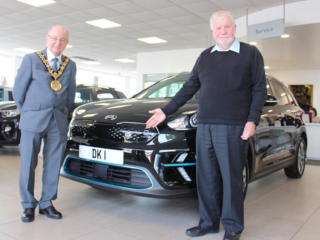 Councillor Billy Sheerin, Mayor of Rochdale, and Councillor Allen Brett, leader of Rochdale Borough Council, with the new mayoral electric car