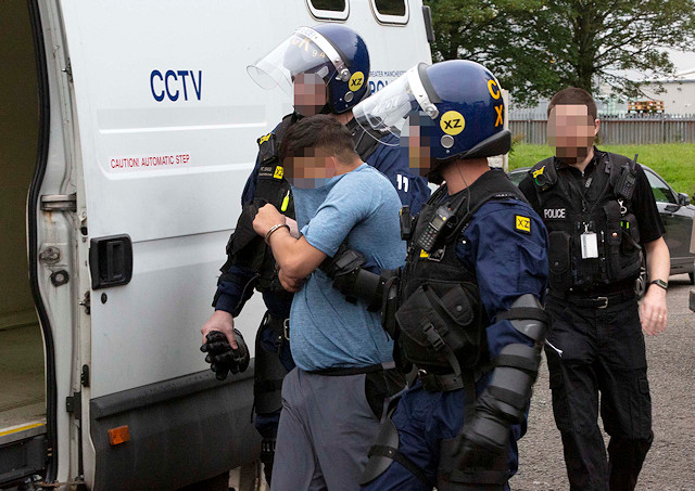 A man being arrested during Operation Gallant