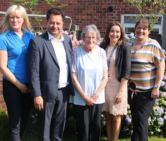 Heywood resident Margaret Ferry (centre), with her daughter Margaret Miller (right), celebrate the award nomination with Kathryn Bamford, of Rochdale Borough Council; Councillor Iftikhar Ahmed, cabinet member for adult care; and Kathryn Andrew, service development manager at Rochdale Borough Council