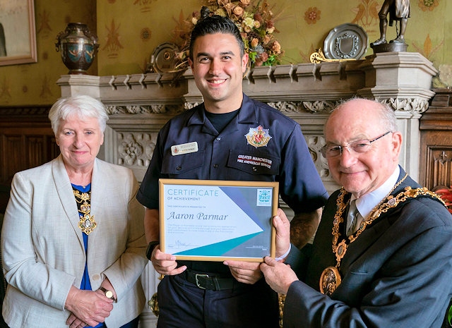 Aaron Palmer presented with a certificate of achievement by the Mayor Billy Sheerin and Mayoress Lynn Sheerin 