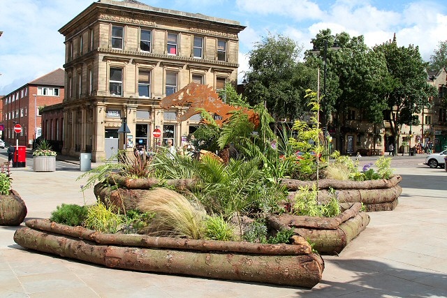 Rochdale town centre Dippy the Dinosaur pop-up garden - Regional judging day for Rochdale In Bloom