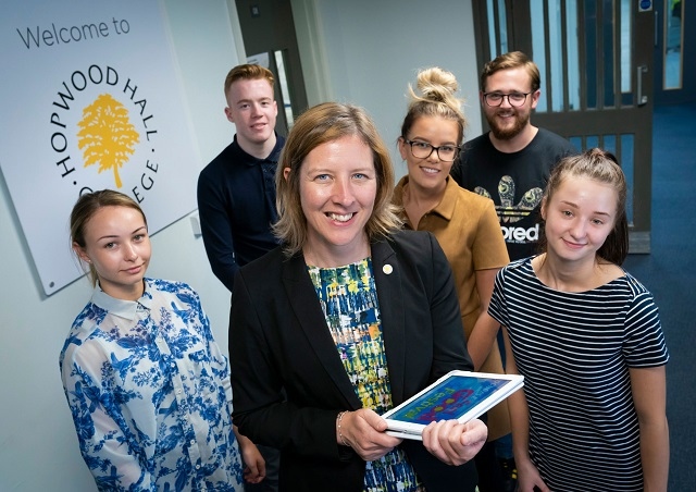 Julia Heap, the college’s principal and CEO (front) with students and staff at Hopwood Hall College’s Middleton campus.