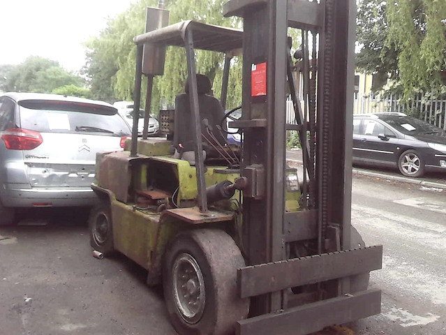 A shipping container and fork lift truck (pictured) had been left abandoned blocking the highway