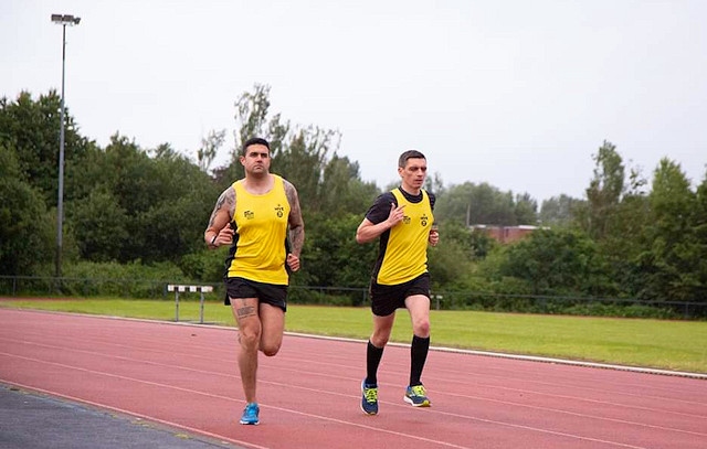 Aaron Parmar (left) and Kevin Holland (right) have set up the Hive 22 running club in memory of the 22 Manchester bombing victims