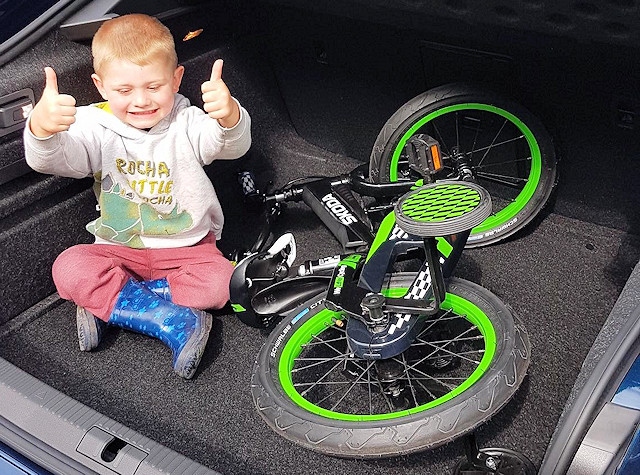 Emmett, with his new Škoda bicycle