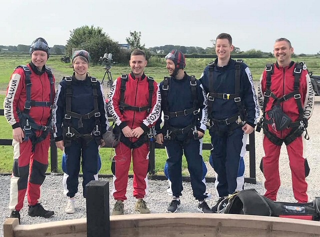 Neil Taylor and other fundraisers in their jumpsuits ready for the big jump