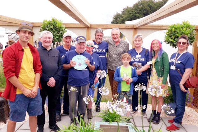 Tony Lloyd MP at Tatton Park with Petrus PIER, a Rochdale community gardening group who won the People's Choice award
