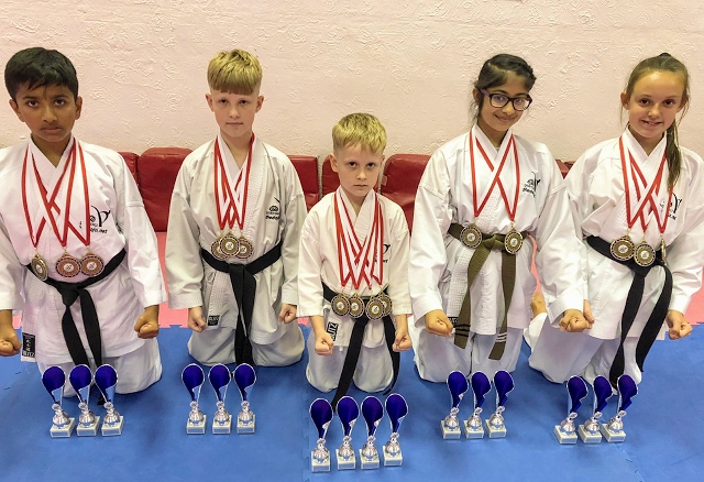 The DOJO Karate Centre children who won three events and Damien Tarasevic who won all four events in his category