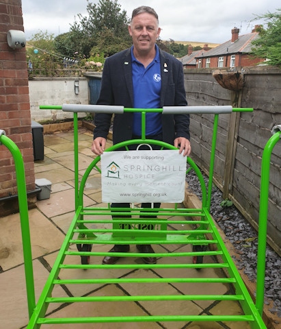 John Keogh with the Springhill Hospice bed