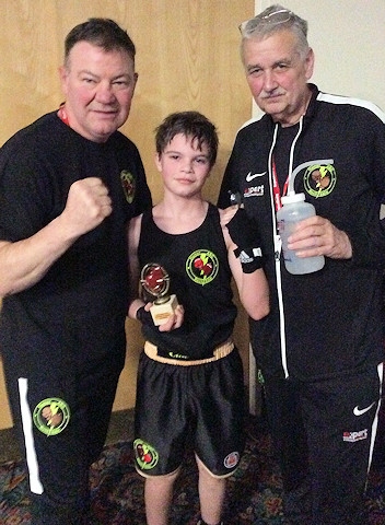 Coach Steven Connellan, 12-year-old Charlie Braddock and Coach Alan Bacon