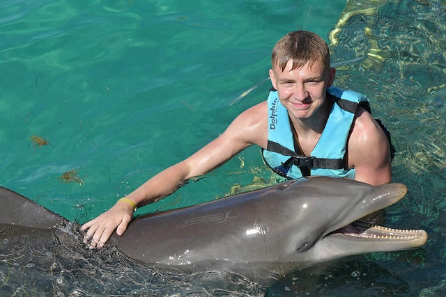 William with a dolphin