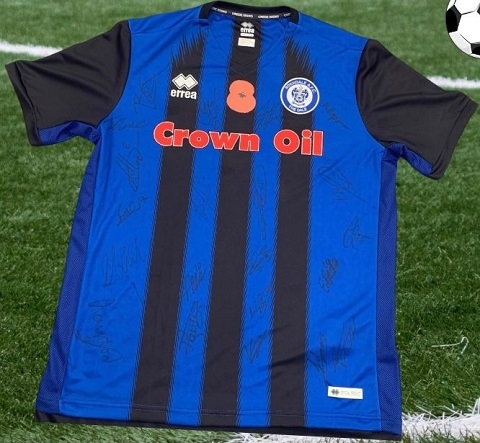 A shirt signed by Rochdale AFC is up for grabs