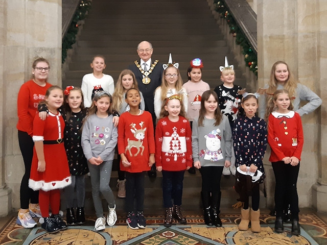 Mayor Billy Sheerin had afternoon tea with children who helped pack bags at local stores over Christmas