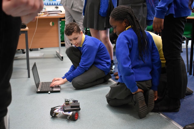 Hollin Primary School pupils programme robots using basic code