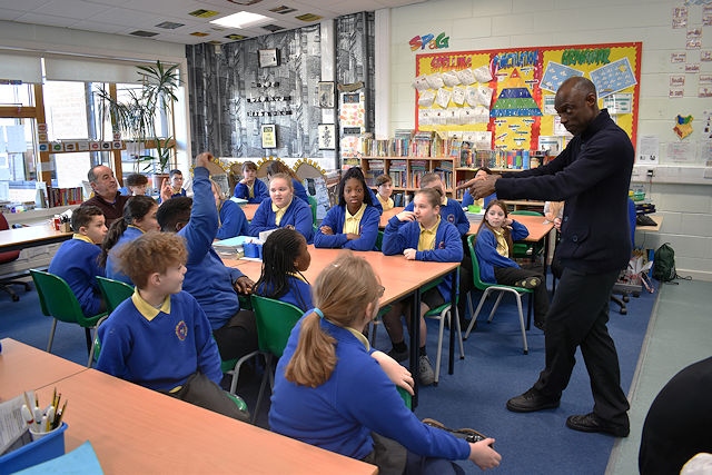Hopwood Hall College IT lecturers teach pupils at Hollin Primary School
