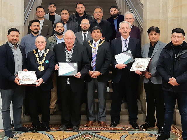 Mayor Billy Sheerin with retired cricket players at Rochdale Town Hall