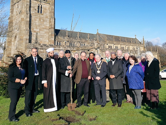 Mayor Billy Sheerin took part in a tree planting at St Chad's Parish Church for Reverend Mark Coleman's retirement