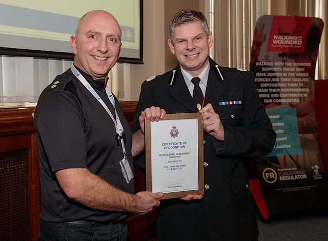 Inspector Jim Jones receives an award