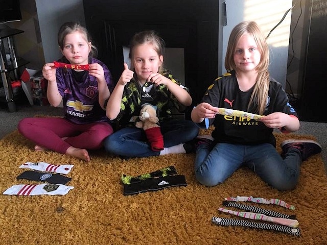 Milnrow triplets sew PPE headbands for NHS workers
