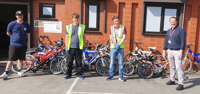 Waterfoot Auctions delivering a donation of 22 bikes to Positive Cycles