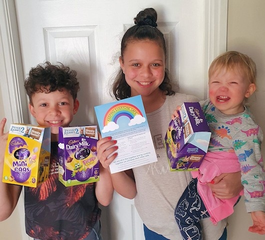 Charlie, Eva-Leigh and Rosie Marshall from Burnedge, Rochdale, with their Easter eggs