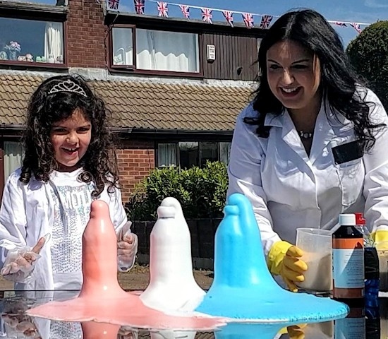Sarar Hany with daughter Aaliyah demonstrating the ‘VE Day elephant’s toothpaste’ experiment at their home in Milnrow