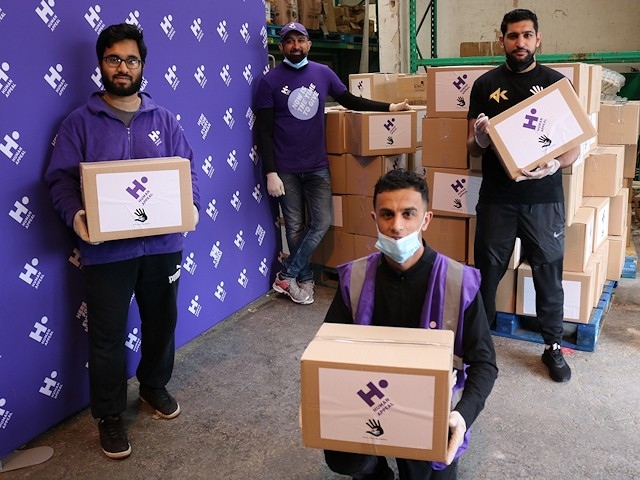 Amir Khan with volunteers from Human Appeal