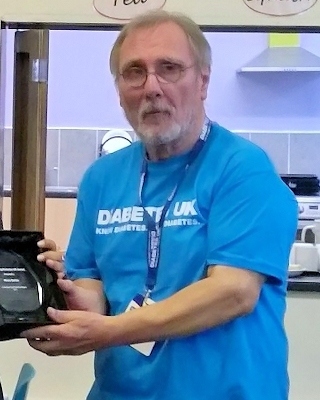 Henry Gerber with his Inspire Award from Diabetes UK