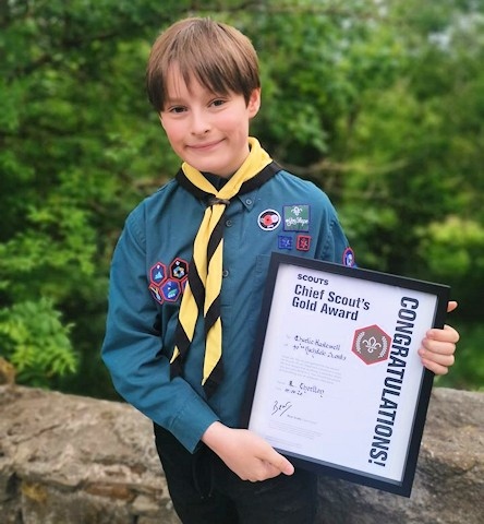Charlie Hastewell with his Chief Scout Gold Award